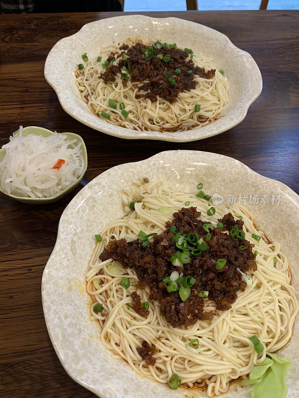 Minced pork noodles with chili oil sauce (臊子面) with the sichuan kimchi and soup